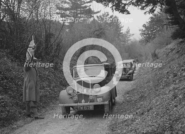 Two Standards competing in a Standard Car Club trial, late 1930s. Artist: Bill Brunell.