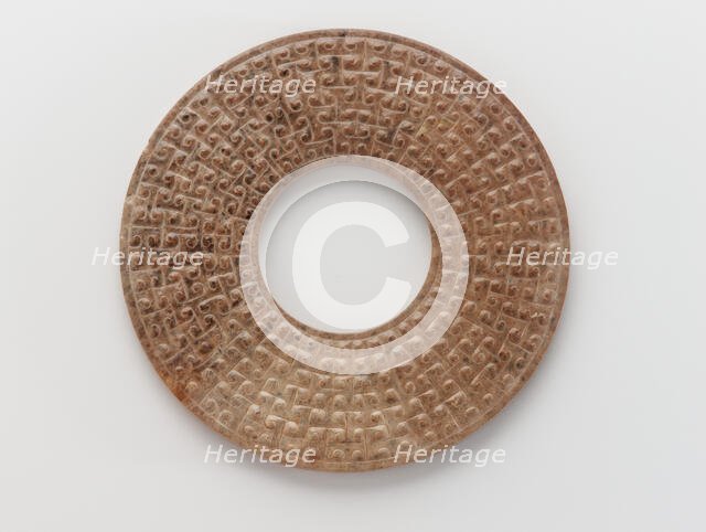 Pendant in the form of a disk (bi) with raised knobs, Eastern Zhou dynasty, 475-221 BCE. Creator: Unknown.