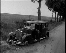 Car Crashed at  the Side of the Road in the French Third Republic, 1940. Creator: British Pathe Ltd.