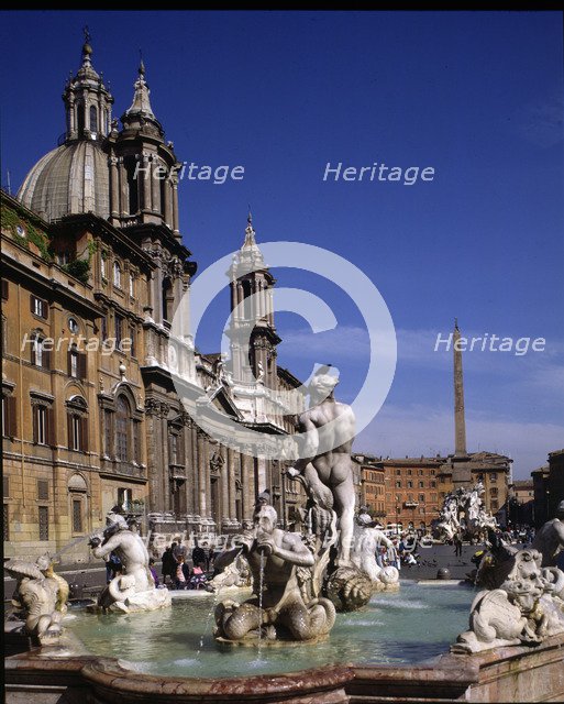 Detail of the Fountain of the Rivers and the Church of St. Agnes, both are Baroque style.
