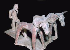 Greek terracotta of a man ploughing, 6th century BC. Artist: Unknown