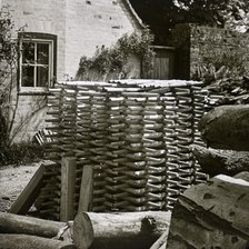 Stack of turned chair legs, Turville, Buckinghamshire, early 20th century. Artist: Unknown.