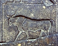 Negative relief on a pillar of Ramses II with the image of a bull, 1250 b.C..