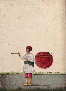 An Indian bearer holding a large, richly decorated fan or banner..., (between 1800 and 1899?). Creator: Unknown.