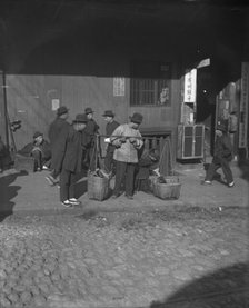 The vegetable peddler, Chinatown, San Francisco, between 1896 and 1906. Creator: Arnold Genthe.