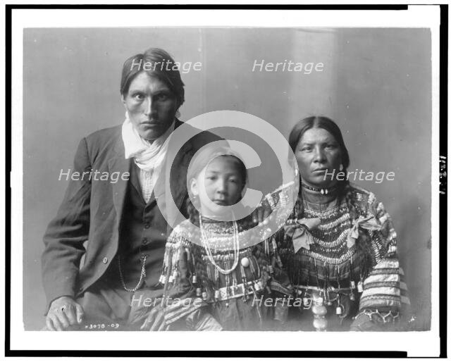 Reuben Black Boy and family, c1910. Creator: Edward Sheriff Curtis.
