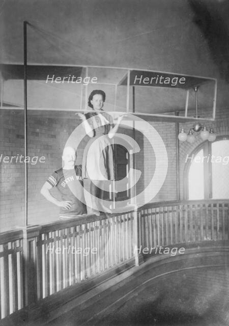 Woman in aeroplane ready for swimming, Pittsburgh, 1910. Creator: Bain News Service.