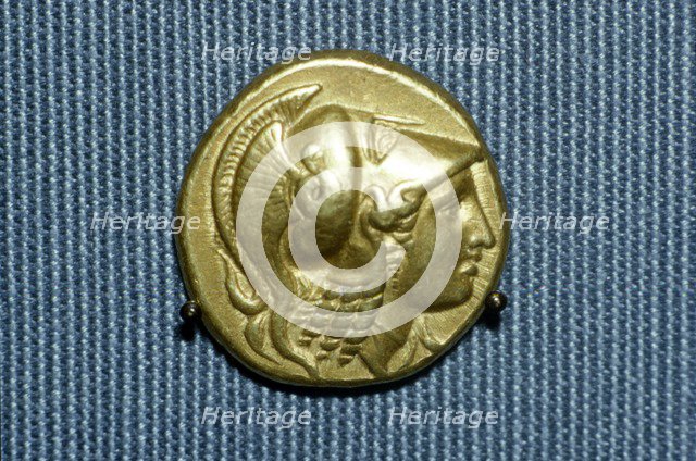 Greek Coin, Head of Athena on a gold stater of Alexander the Great, 336-323 BC. Artist: Unknown.