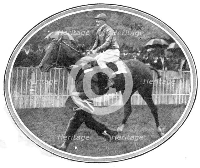 Leading in the winner of the Grand Prix, Baron M. de Rothschild's Verdun (M. Barat up), 1909. Creator: Topical Press Agency.