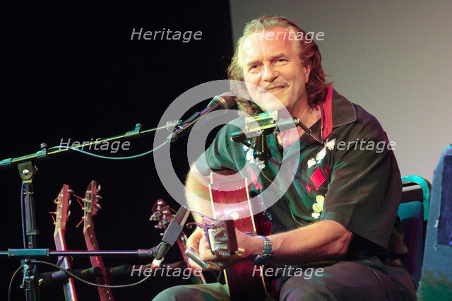 Hans Theessink, Hawth, Crawley, West Sussex, 2014.  Artist: Brian O'Connor.