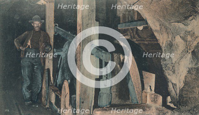 'In a Rand Mine - An end Tipler', early 20th century. Creator: Unknown.