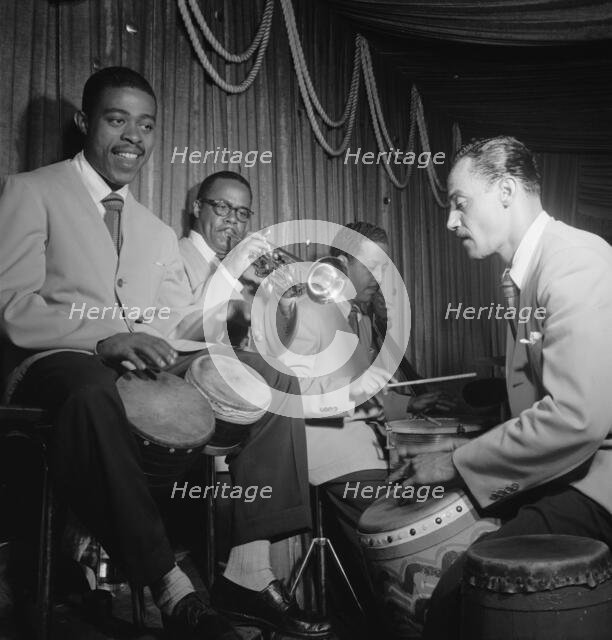 Portrait of Mario Bouza, Jose Mangual, Carlos Vidal(?), and Ubaldo...Glen Island Casino, N.Y., 1947. Creator: William Paul Gottlieb.