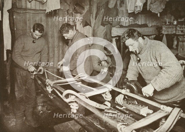 'Preparing Sledges for the Polar Journey (Crean, Forde, Lashly, P.O. Evans)', c1911, (1913).  Artist: Herbert Ponting.