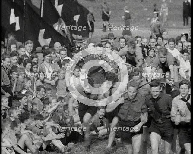 Hitler Youth Boys Engaging in Sporting Activities at  a Camp, 1930s. Creator: British Pathe Ltd.