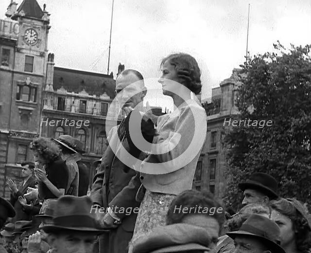 Crowds Applauding a Military Band at Trafalgar Square, 1940. Creator: British Pathe Ltd.