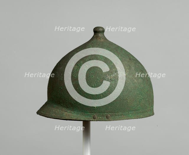 Helmet of the Montefortino Type, Etruscan, late 4th-early 3rd century B.C.; cheekpieces, modern. Creator: Unknown.