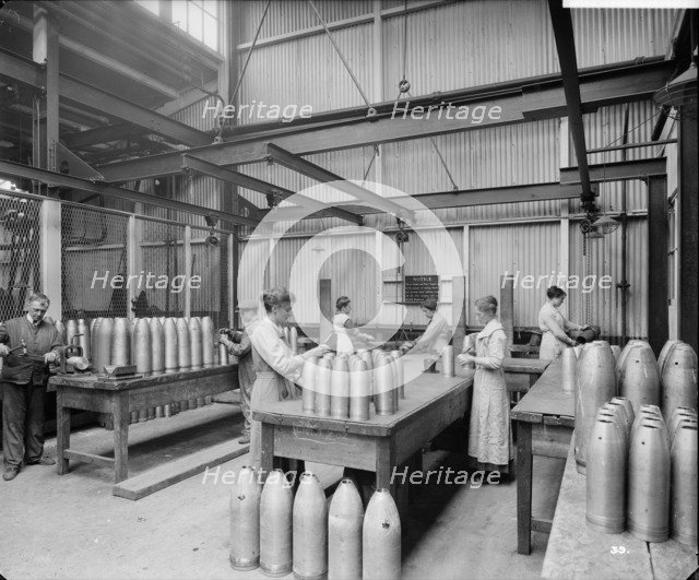 Preparing projectile heads at Cunard Shell Works, Merseyside, 1917. Artist: Bedford Lemere and Company