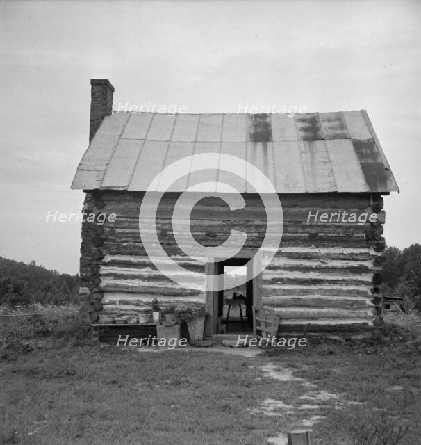 Possibly: Young sharecropper and his first child, Hillside Farm, Person County, North Carolina, 1939 Creator: Dorothea Lange.