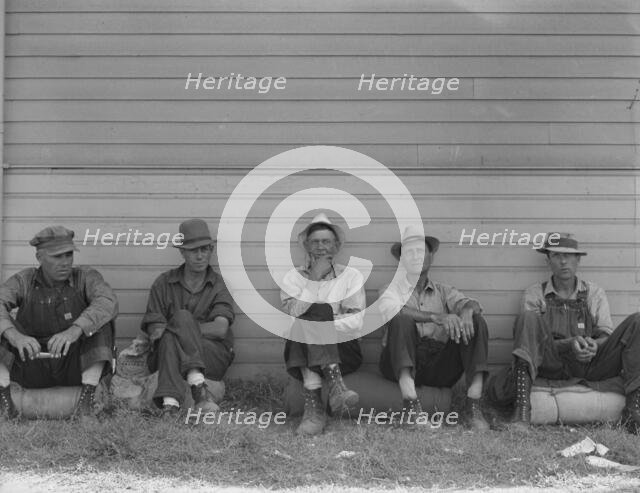 Bindle stiffs in town three weeks before opening of Klamath..., Tule Lake, Siskiyou County, CA, 1939 Creator: Dorothea Lange.