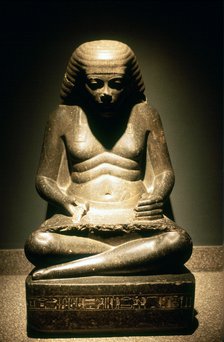Granite statue of a seated Ancient Egyptian scribe, from Karnak, 17/18th dynasty, c1500 BC. Artist: Unknown