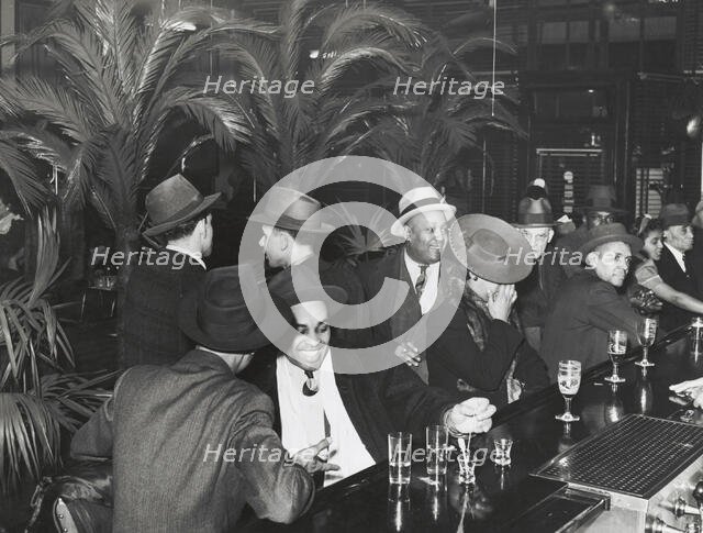 The bar at Palm Tavern, Negro restaurant on 47th Street, Chicago, Illinois, April 1941. Creators: Farm Security Administration, Russell Lee.