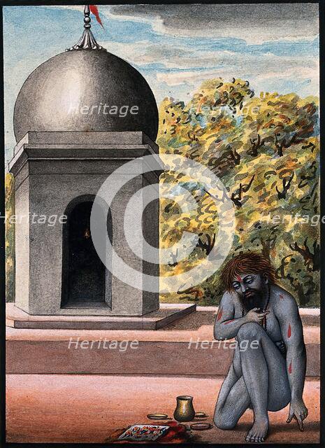 A Hindu ascetic or holy man, performing austerities outside a temple (?), 1880. Creator: Unknown.