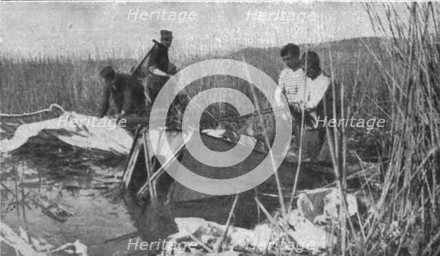 'La guerre aerienne en Macedoine Grecque : un avion ennemi "Descendu" dans..., 1916. Creator: Unknown.