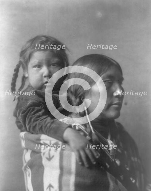 Apsaroke mother, c1908. Creator: Edward Sheriff Curtis.