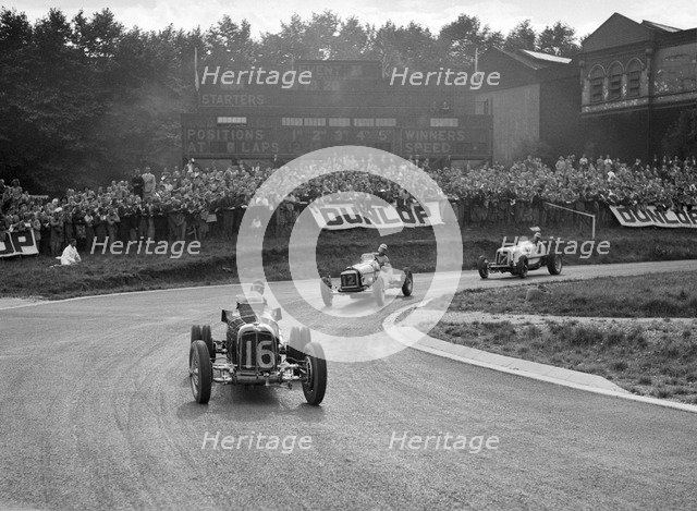 Raymond Mays' ERA leading an MG and another ERA, Imperial Trophy, Crystal Palace, 1939. Artist: Bill Brunell.