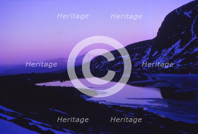 Scotland, Ross-Shire. Sunset at Loch Toll  An Lochain below An Teallach, April. Artist: CM Dixon.