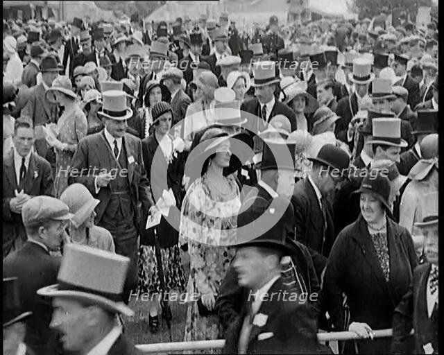 A Large Crowd of Smartly Dressed People in Hats at Ascot Horse Racing Track, 1931. Creator: British Pathe Ltd.