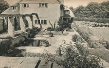 'Garden of Wood House Copse, Holmbury St. Mary. Looking East',  c1926. Artists: Oliver Falvey Hill, Unknown.