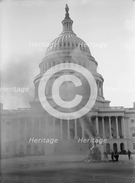 U.S. Capitol - Cleaning Exterior, 1913. Creator: Harris & Ewing.