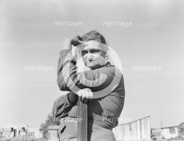 Arkansas mother, now a rural rehabilitation client, Tulare County, California, 1938. Creator: Dorothea Lange.