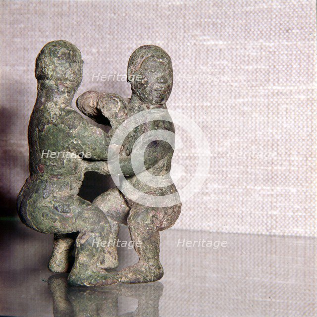 Chinese Bronze Wrestlers, Late Zhou Dynasty, 4th century BC-3rd century BC. Artist: Unknown.