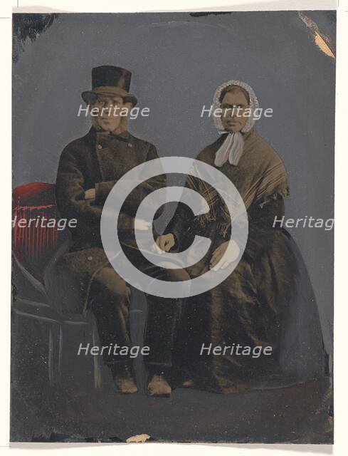 Portrait of seated couple, 1860s-1880s. Creator: Unknown.