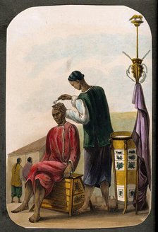 A barber shaving a seated man's head. Creator: Unknown.