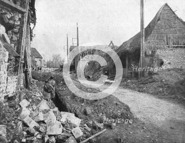 ''Notre offensive d'Artois; La rue principale d'Ablain-Saint-Nazaire', 1915. Creator: Unknown.