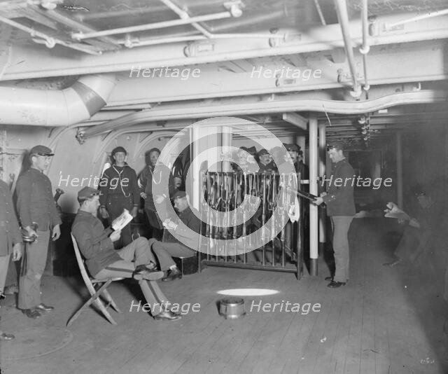 U.S.S. Brooklyn, group on gun deck, between 1896 and 1899. Creator: Unknown.