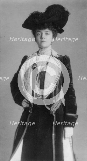 Mrs. Alice Roosevelt Longworth, three-quarter length portrait, standing with..., c1902. Creator: Frances Benjamin Johnston.