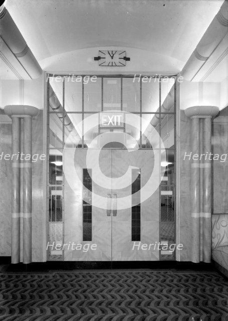 The exit to the foyer, Odeon cinema, Leicester Square, London, 1937. Artist: J Maltby