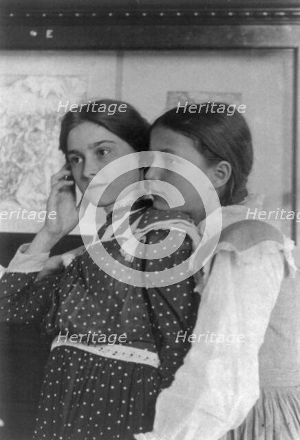 Two girls from a Washington, D.C., school on a class visit to the Library of Congress..., (1899?). Creator: Frances Benjamin Johnston.