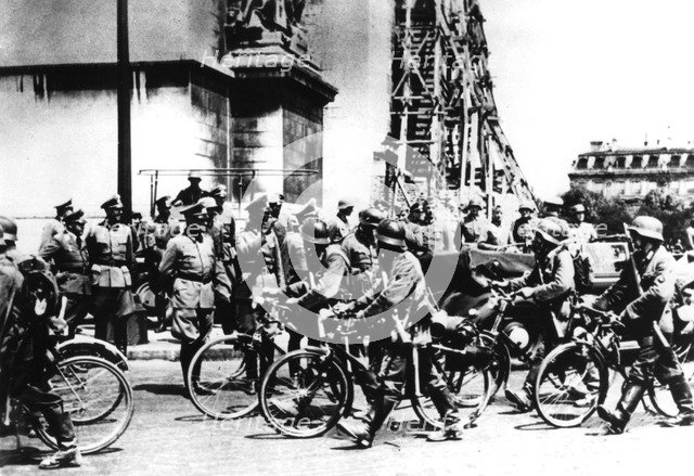 German soldiers marching past the Arc de Triomphe, Paris, 14 June 1940. Artist: Unknown
