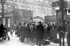Locomotive spotters at Victoria Station, London, 1950. Artist: Henry Grant