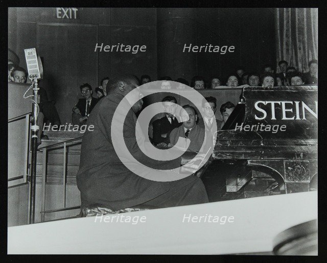Oscar Peterson in concert at Colston Hall, Bristol, 1955. Artist: Denis Williams