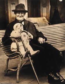 John Daubeny, a centenarian, holding a 1 year old boy, c1922. Creator: Unknown.