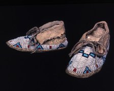 Pair of child's moccasins, Plains, possibly Sioux, c. 1885. Creator: Unknown.