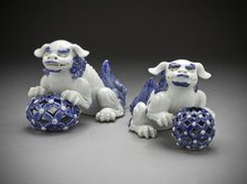 Pair of Okimono in the Form of Chinese Lions on Pierced Balls, 19th century. Creator: Unknown.