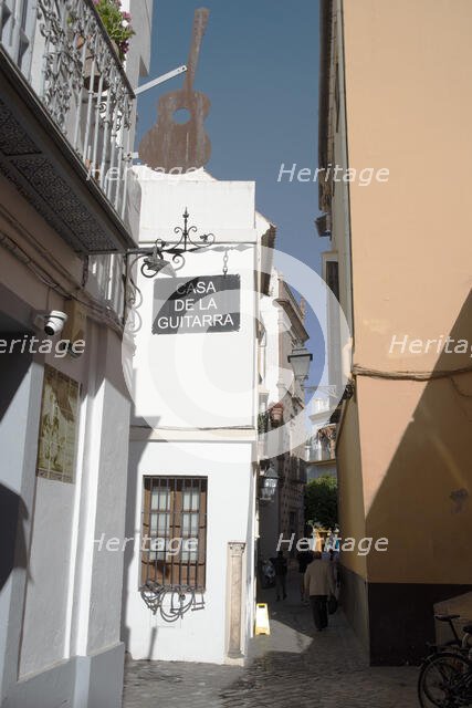 One of the narrow streets in the pedestrian area of the central city, Seville, Spain, 2023. Creator: Ethel Davies.