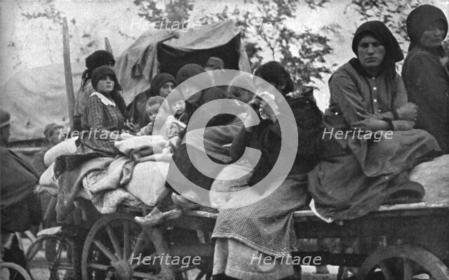 The Dark Hours of Italy; Women and children of Friuli and Carnia fleeing..., 1917. Creator: Unknown.